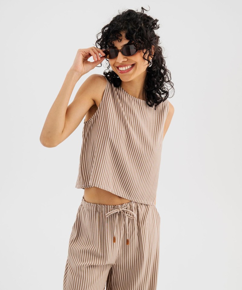 Blouse sans manches ample courte et fluide femme